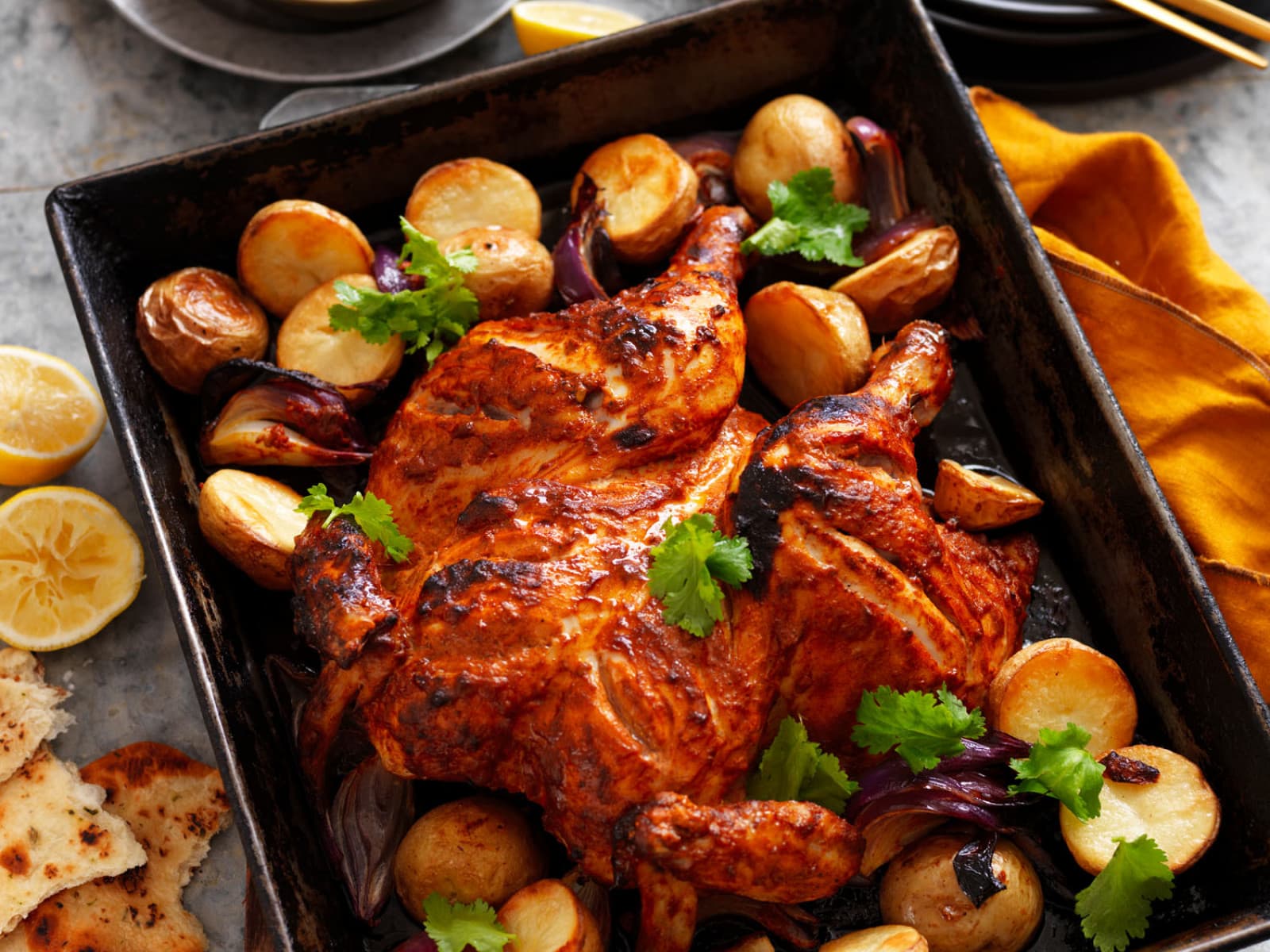 Butterflied tandoori chicken fresh from the clay oven